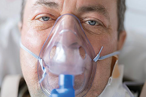 man with respirator on his face. Credit engin akyurt